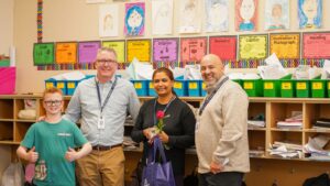 L to R: A fifth grade Cordata student, Cordata Elementary School Principal Craig Baldwin, Ruwani Brohier and Superintendent Greg Baker in classroom after surprise recognition.